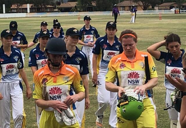 DREAM COME TRUE: Lucy McKelvie-Hill comes off alongside Alex Blackwell after their 70-run partnership for Border Bullets on Sunday.