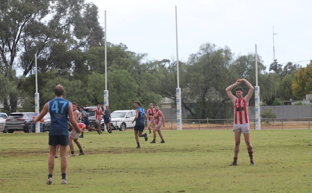 Barellan ruck Jack White looks for options up field against Charles Sturt University last Saturday. Picture by Pigs and Sows 2024 Photos