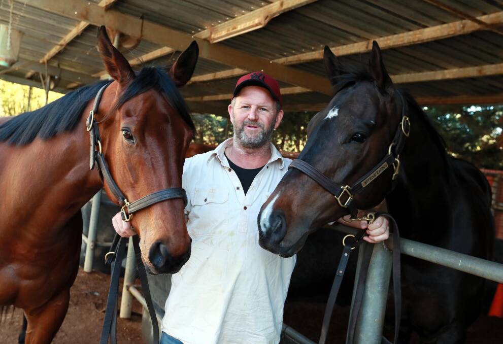 READY TO GO: Wagga trainer Chris Heywood with Underwood (left) and Blitzar (right) ahead of their trip to Randwick on Saturday. Picture: Les Smith
