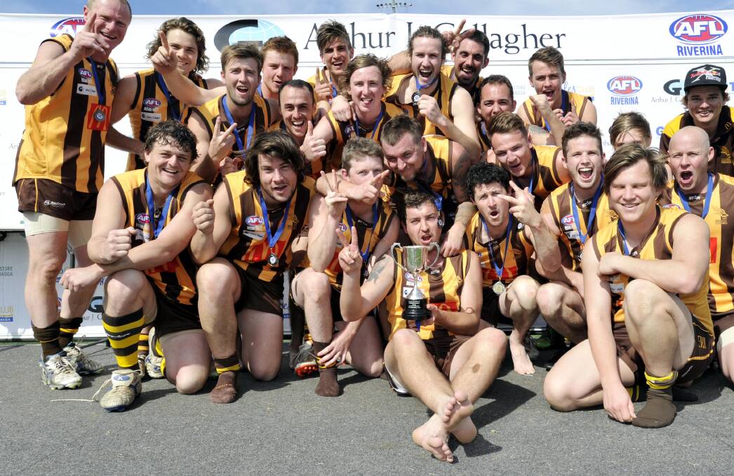 BACK-TO-BACK: East Wagga-Kooringal enjoy their reserve grade premiership win over The Rock-Yerong Creek at Robertson Oval on Saturday. Picture: Les Smith