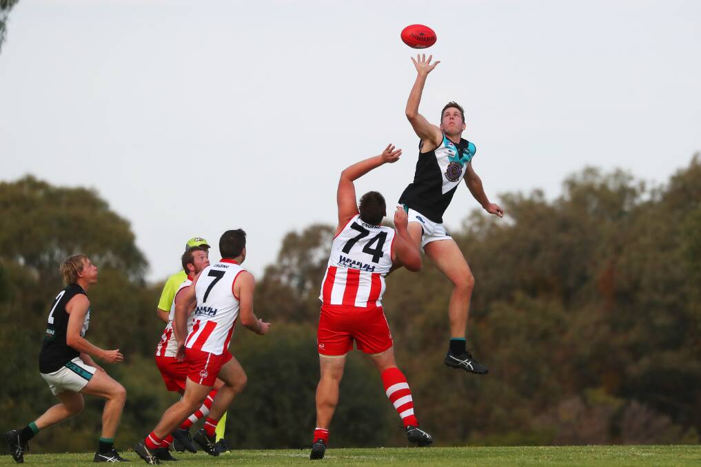 BIG GAME: Northern Jets ruckman Lachie Jones gets over CSU's Andrew Dickins the last time the two teams met at Peter Hastie Oval. The winner between the two teams on Saturday at Ardlethan will sit in fifth spot with five rounds to play. Picture: Emma Hillier