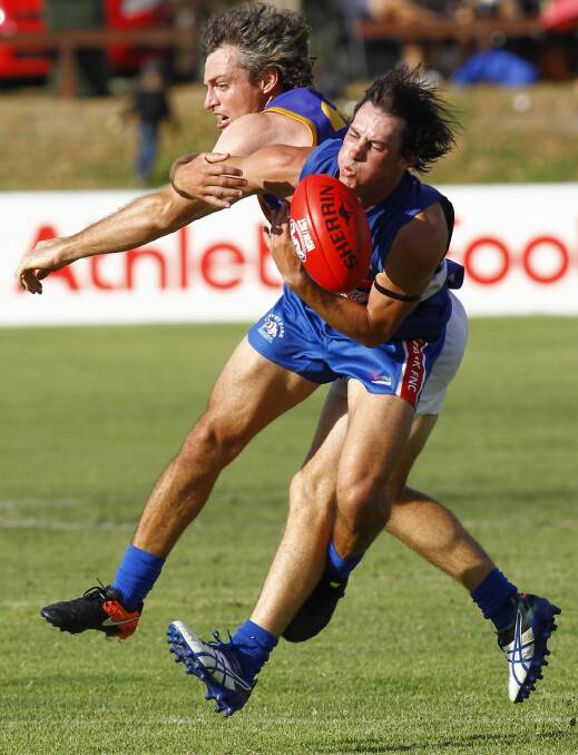 Ryan Pollack and Steve Irons compete the last time Turvey Park and Narrandera met at Maher Oval.