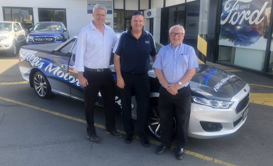 NEW DEAL: Hillis Motor Group dealer principal David Kelly (centre) hands 
over the vehicle to Wagga Harness Racing Club's Graeme White (left) and 
Terry McMillan.
