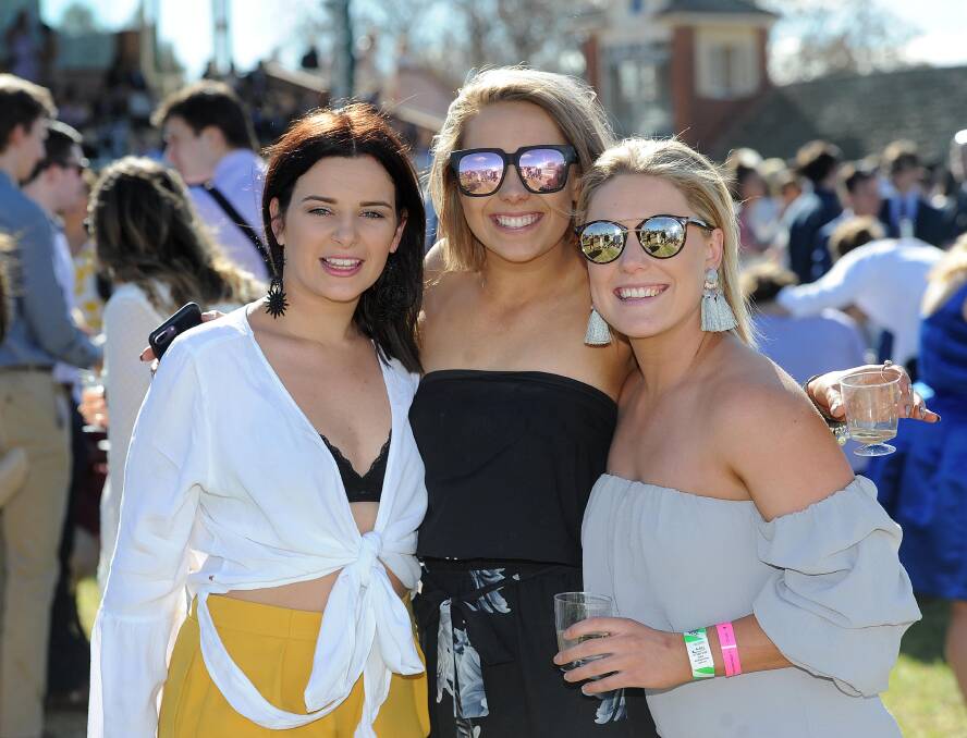 DAY OUT: Grace Green, Gabby McGregor and Jess McDonnell enjoy last year's Ag Races at Murrumbidgee Turf Club.
