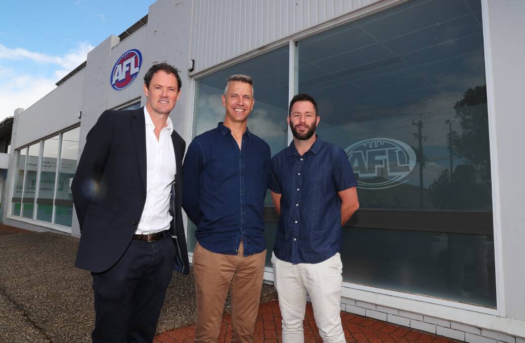 AFL NSW-ACT chief executive Sam Graham (left) with AFL Southern NSW and ACT regional manager Steve Mahar and AFL Southern NSW game development manager Marc Geppert in Wagga on Monday. Picture: Emma Hillier