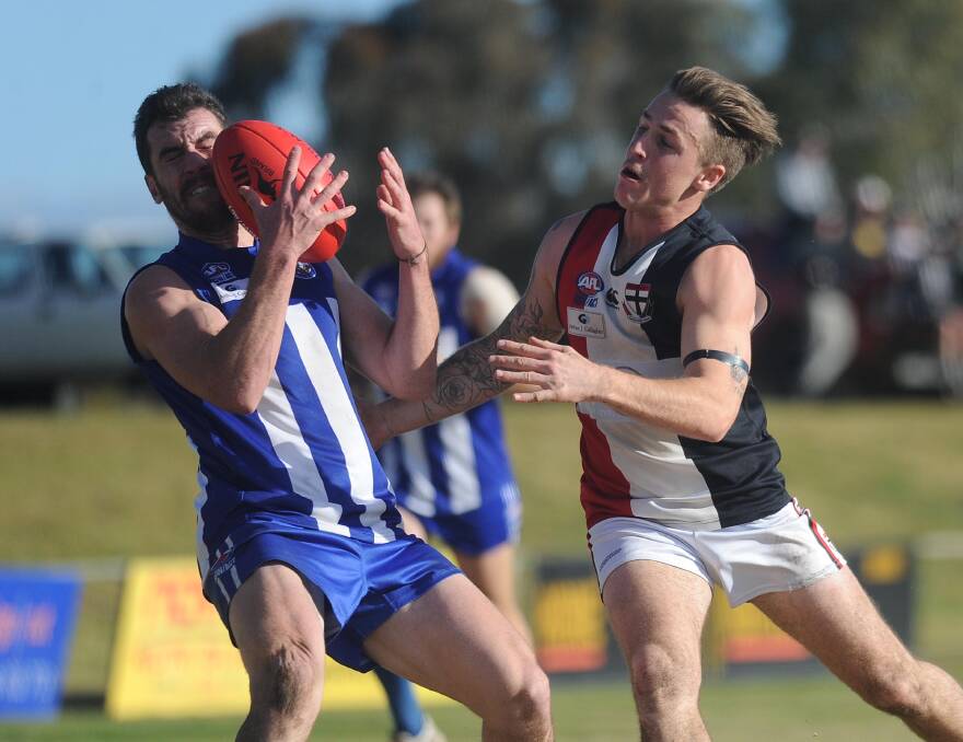 CONTROVERSIAL VENUE: Temora's Kieran Shea and North Wagga's Jacob May battle it out in a Farrer League final at Maher Oval in 2017.