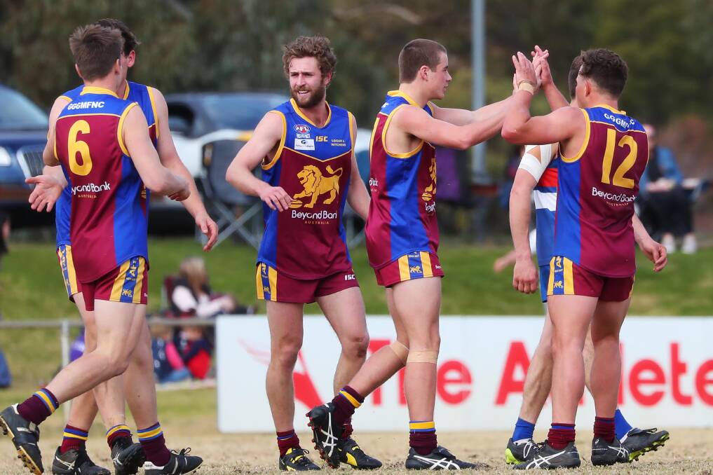 HAPPY DAYS: Ganmain-Grong Grong-Matong players celebrate a goal in the win over Turvey Park at Maher Oval on Saturday. Picture: Emma Hillier