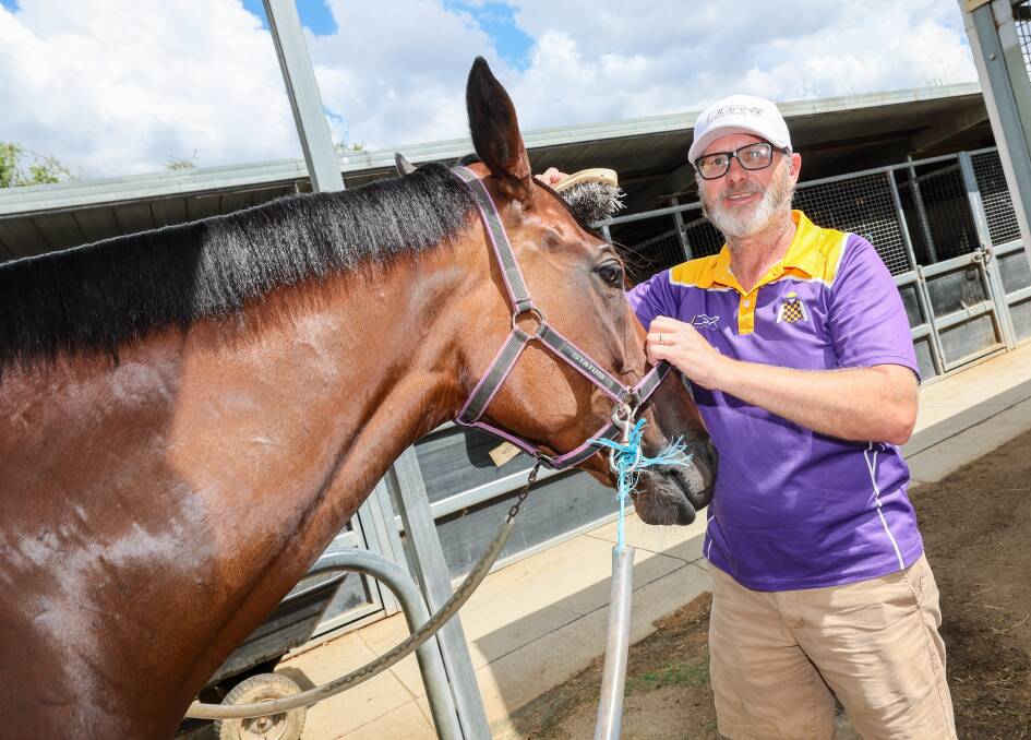 Wagga trainer Doug Gorrel spends some quality time with Asgarda on Friday ahead of the SDRA Country Championships Qualifier. Picture by Les Smith