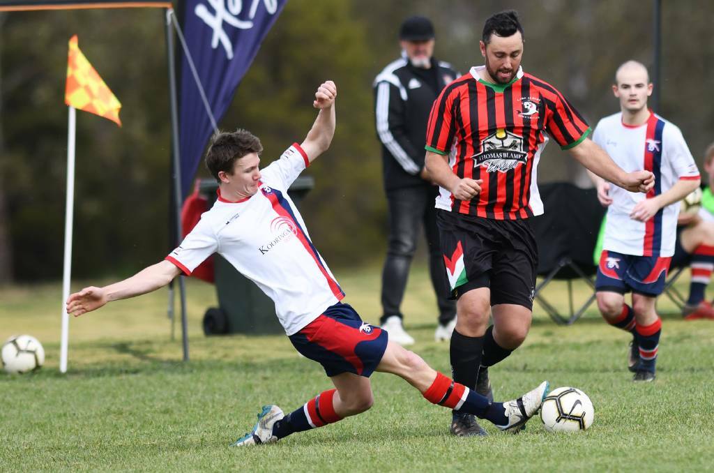 RELIABLE: Chris Hart in action for Henwood Park against Lake Albert's Kane Baumer a couple of years ago.