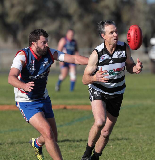 Roland Finch (left) returns to Northern Jets next year. He played on Terry Daniher when he made his guest appearance for Ungarie in 2016. Picture: Les Smith