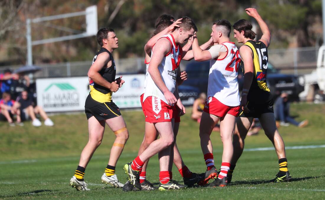 TARGET: Griffith's Lucas (partially obscured) and Jacob Conlan celebrate a goal against Wagga Tigers last weekend. Picture: Emma Hillier