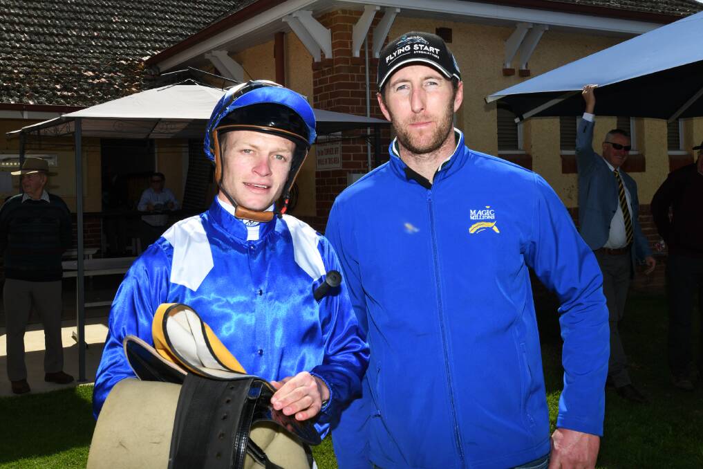 TOP TEAM: Blaike McDougall and Hayes-Dabernig stable representative Erik Broad after the win of Alqaab at Wagga in October.