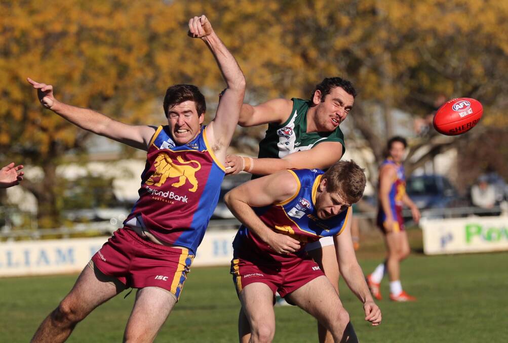 CRUNCH: GGGM's Ben Walsh and Jethro Peck contest with Coolamon's Benj Gillett at Ganmain Sportsground on Sunday. Picture: Les Smith