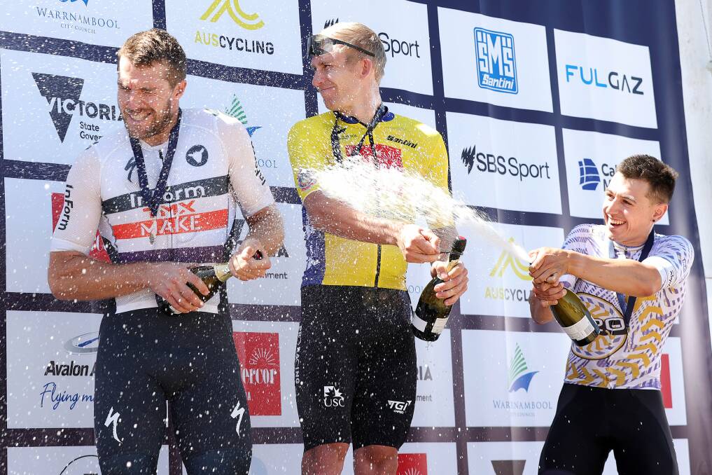 CELEBRATION: Myles Stewart (right) gets the party started alongside Cam Scott (middle) after their podium finish at the Melbourne to Warrnambool Cycling Classic. Picture: Con Chronis