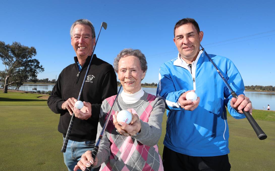 THREE OF A KIND: Paul Castle, Claire Castle-Slater and Michael Castle at the 18th hole at the Wagga Country Club on Friday. Picture: Les Smith