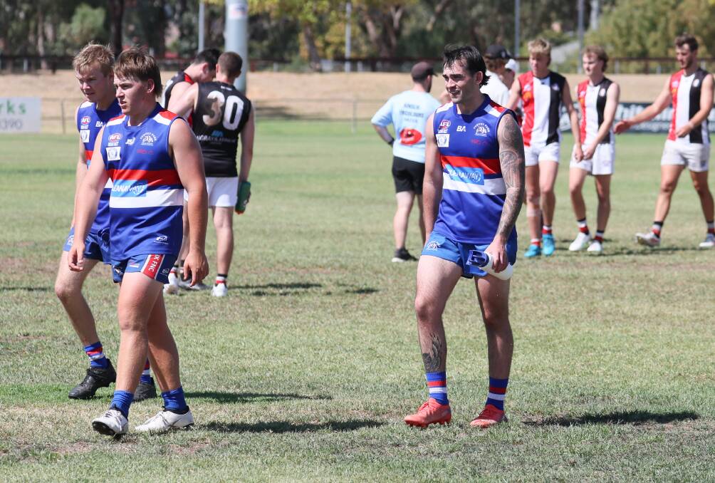 Turvey Park footballers come from Maher Oval after the completion of their hit-out against AFL Canberra club Ainslie on Saturday. Picture by Les Smith