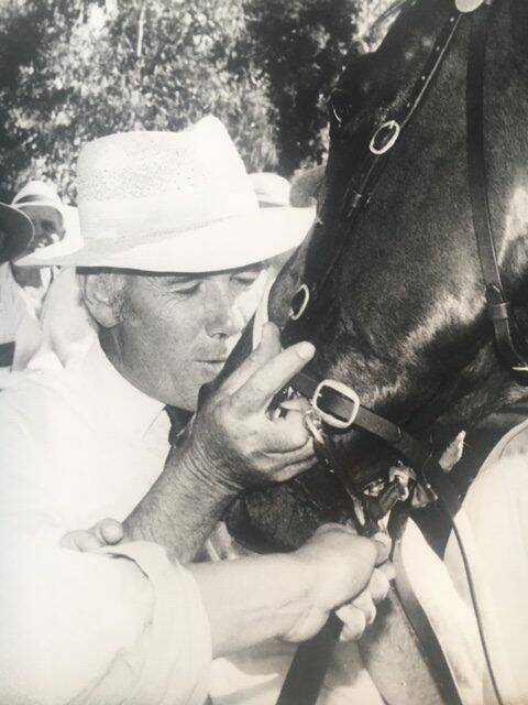 The late Bill Spackman embraces Money Road after his Harden Cup win.