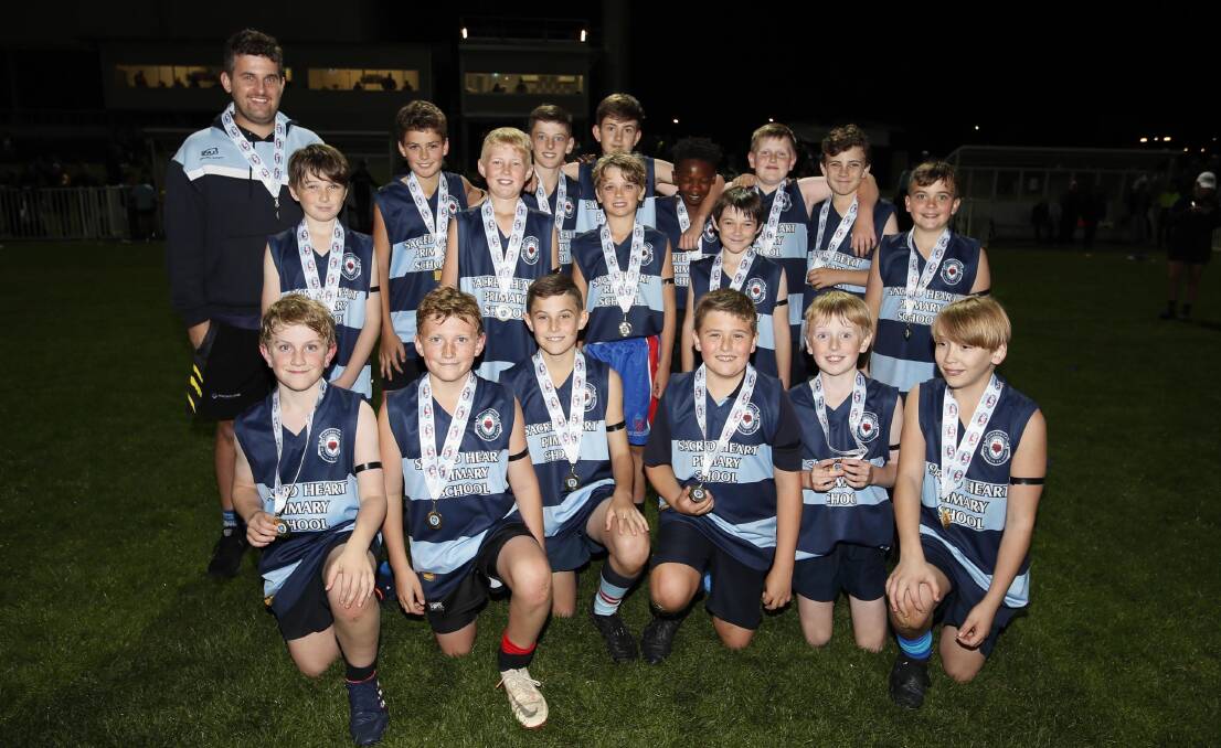 NUMBER ONE: Sacred Heart Primary School took out the Wagga final of the Paul Kelly Cup at Robertson Oval on Wednesday night. Pictures: Les Smith