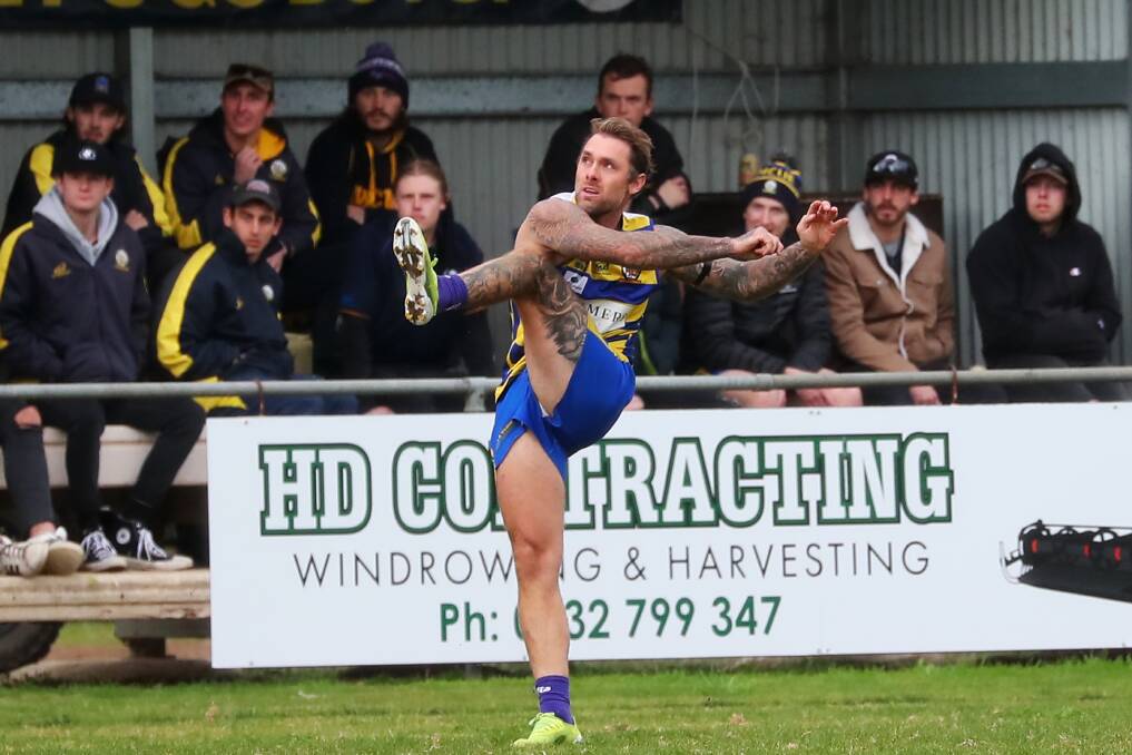 ENTERTAINER: Mangoplah-Cookardinia United-Eastlakes full-forward Trent Castles has a shot on goal during the win over Coolamon at Mangoplah Sportsground on Sunday. Picture: Emma Hillier