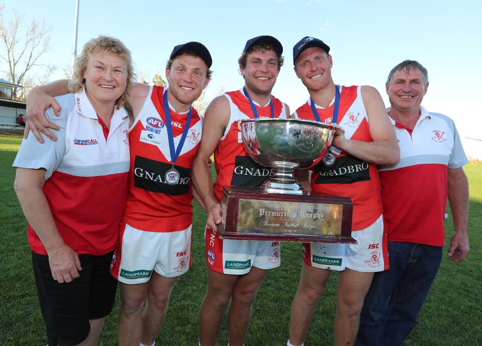 ALL IN THE FAMILY: Diny, Matt, Jayden, Ben and Brian Klemke celebrate Collingullie-Glenfield Park's premiership victory. Picture: Les Smith
