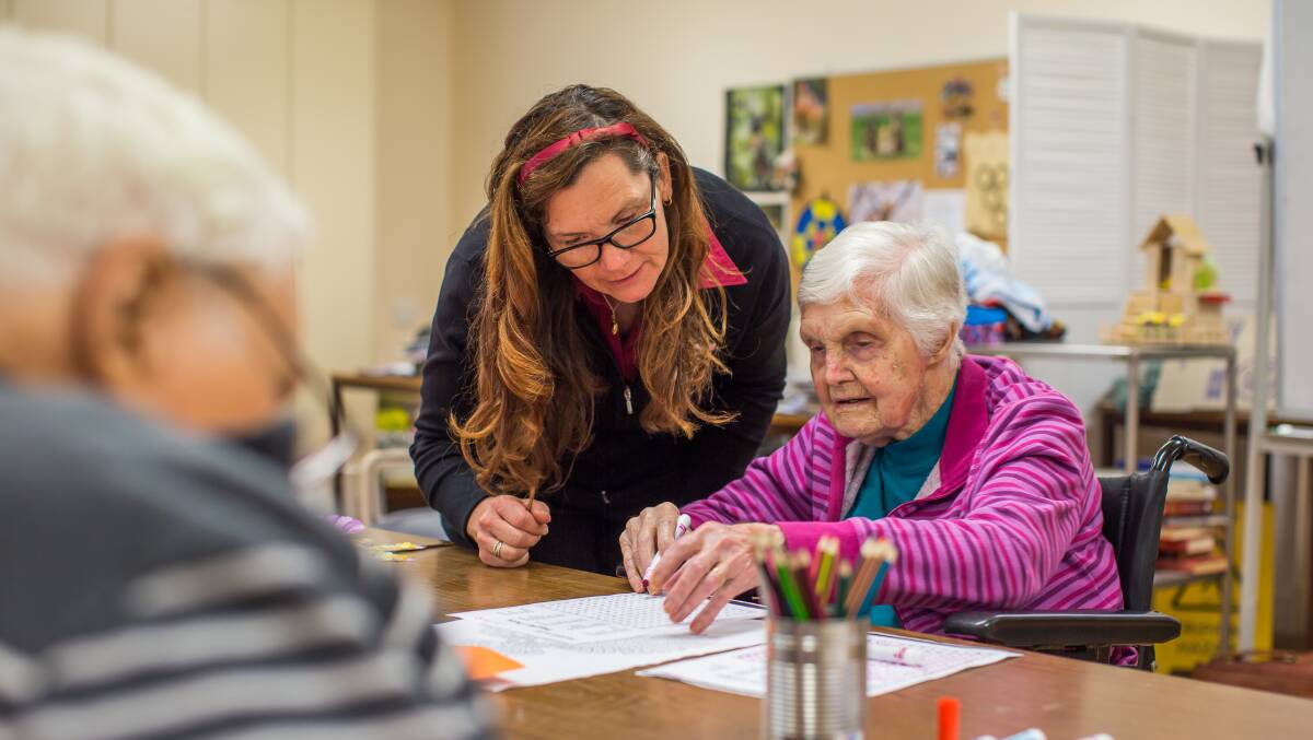 ENGAGED: Residents of The Forrest Centre, including Lettie Lockett (right) with staff member Helen Supple, can participate in as many activities as they like.