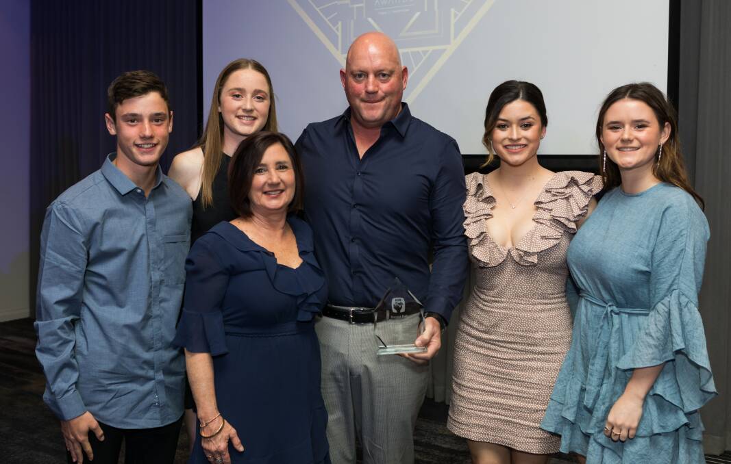 FAMILY AFFAIR: Peter Hurst and wife Deb (centre) shared the awards night with their children (from left) Wil, Abbey, Kate and Hannah.