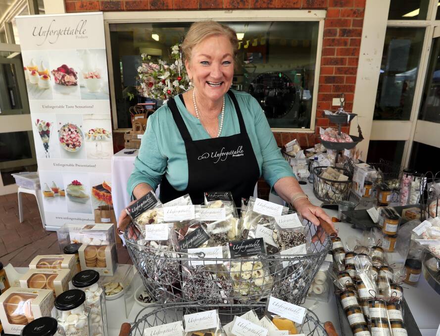 WHAT TO BUY?: Leanne Pooley shows of her wares at the one of more than 90 stalls on site last year's fair.
