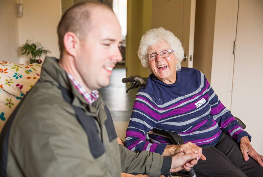 LIFESTYLE: Rev Adam Mannion spends time with The Forrest Centre resident Hilda McMaster. Residents are able to live independently and made to feel like they are at home.