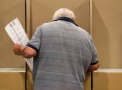 Filling out the almost comically large Senate ballot paper can be a daunting task. Photo: Adam McLean