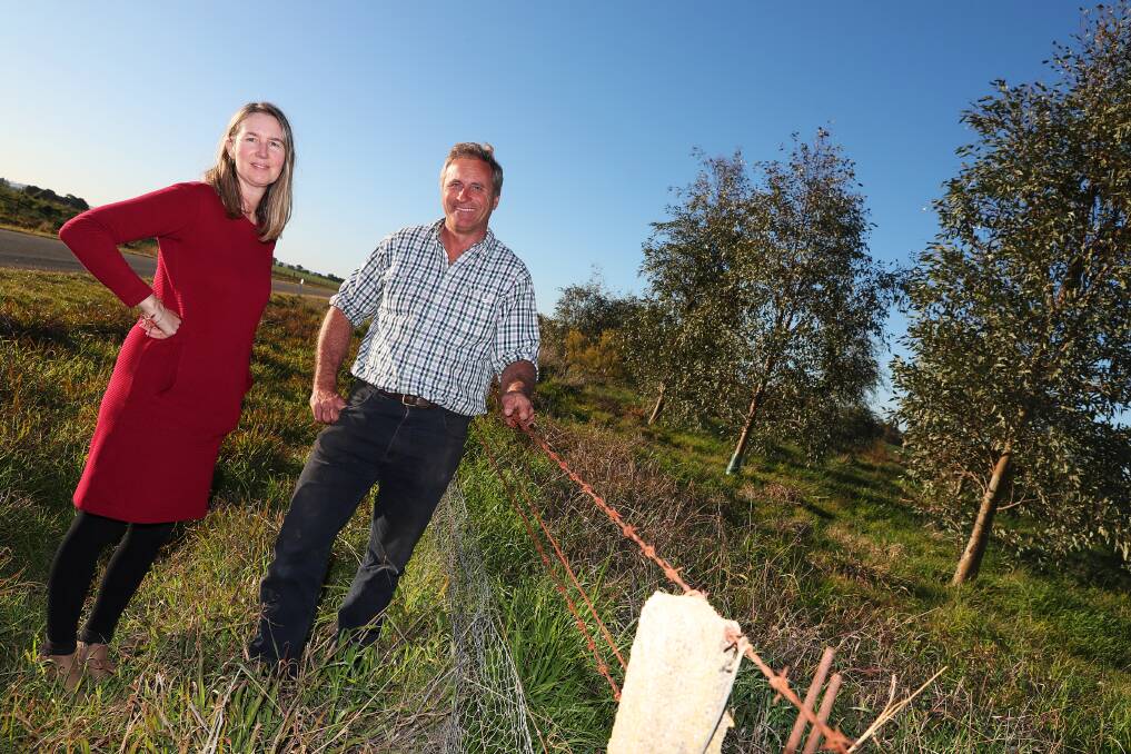 Kym Witney-Soanes and James Stephens of CSU Greens survey the area where the trees will go.