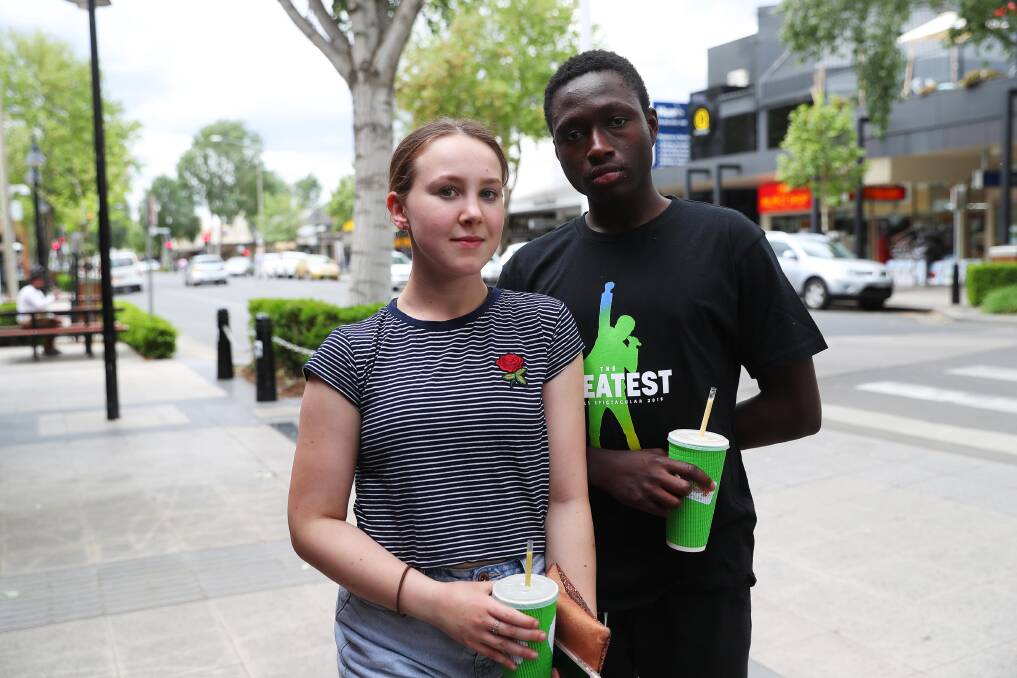 BUG BIND: Charlotte Bruce-Goodlet, 17 and Abu Kebe, 17 on Baylis Street where the aphids were in high supply on Tuesday.