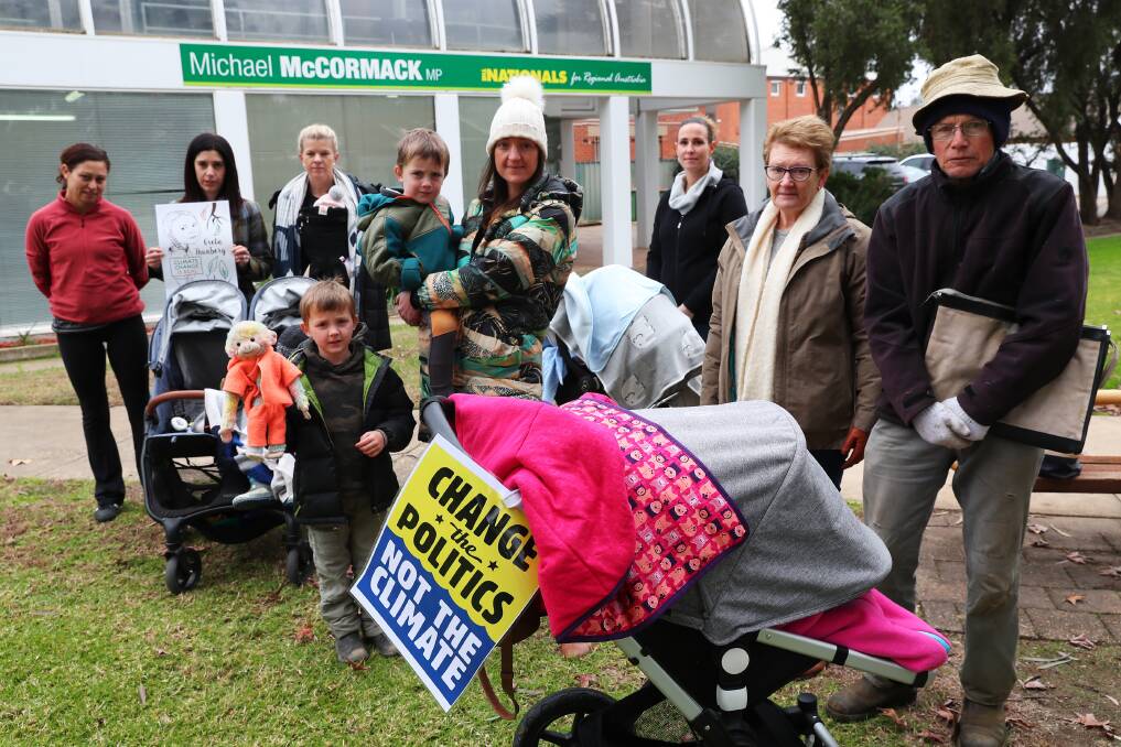 PROTESTERS IN THE PARK: The group of professionals braved the wintery solstice weather to host the weekly picnic protest outside the office of Deputy Prime Minister Michael McCormack.
