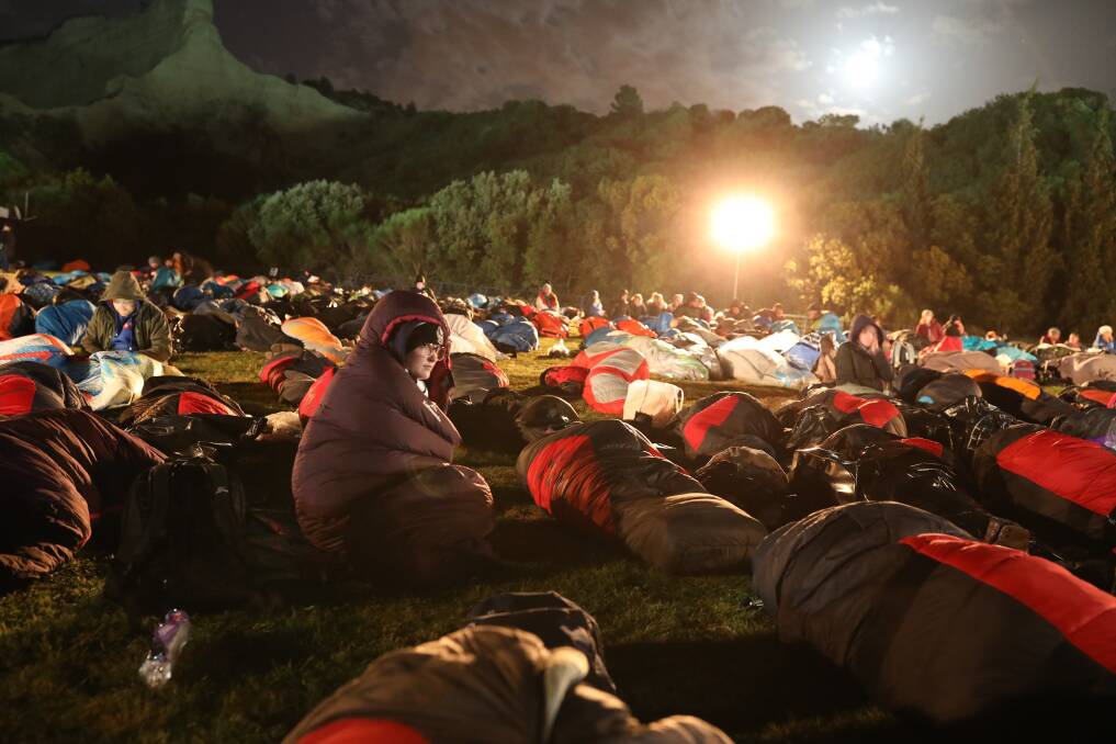CAMP OUT: As dawn broke on April 25, 1919, families of soldiers, leaders and visitors gathered near former battlefields of Gallipoli. Picture: AP Photo/Emrah Gurel 