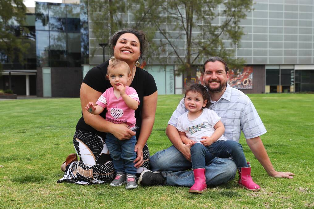 Meleseini and Brendan Tai- Roche with daughters Olivia, 1, and Moana, 3. Picture: Emma Hillier