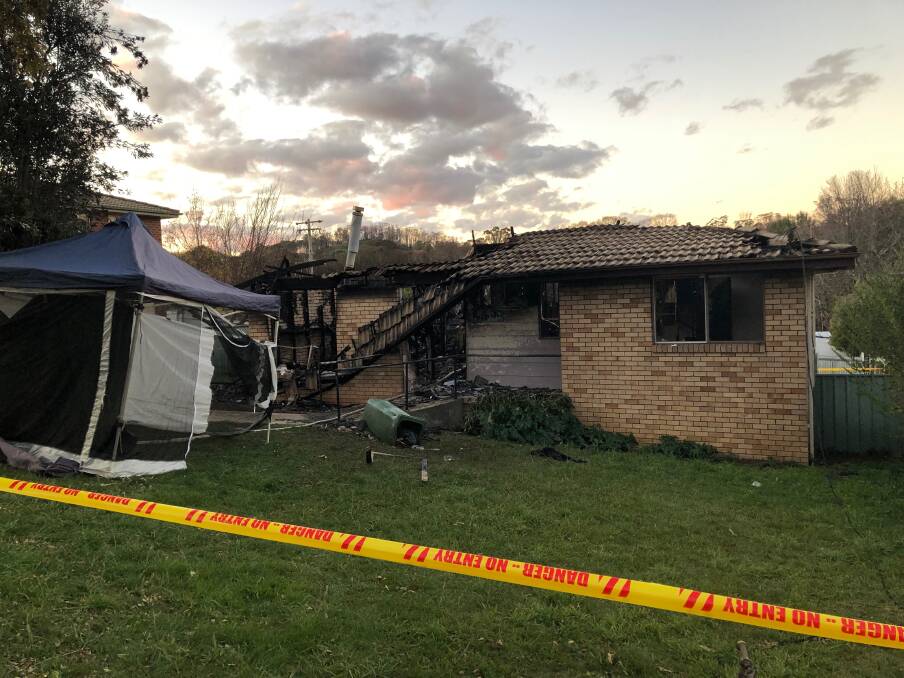 DESTROYED: Investigators are examining the Mayday Street house for clues as to how the fire broke out. Twin three-year-old girls lost their lives in the blaze. Picture: Catherine Mcleod