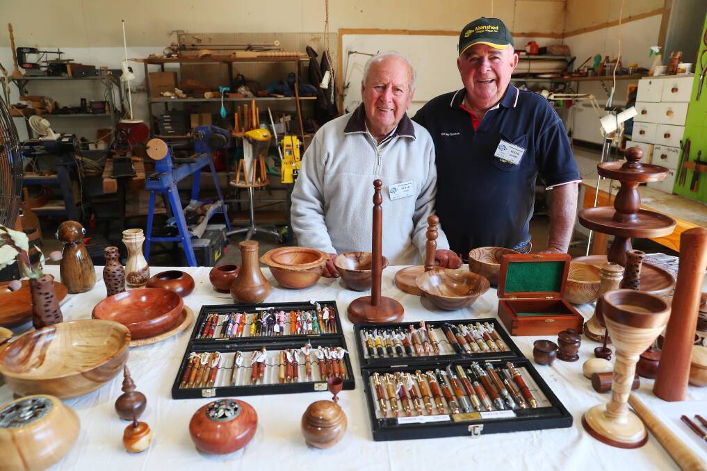Peter Scott and Peter Quinane in the carpentry workshop with items built during the Thursday afternoon woodshop meetings. Picture: Emma Hillier