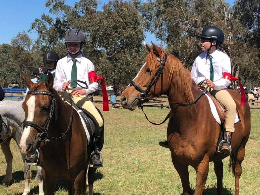 Lila Taylor and horse Flash, with Jordan Irons on Dee at the Lake Albert gymkhana event on October 21. Picture: supplied