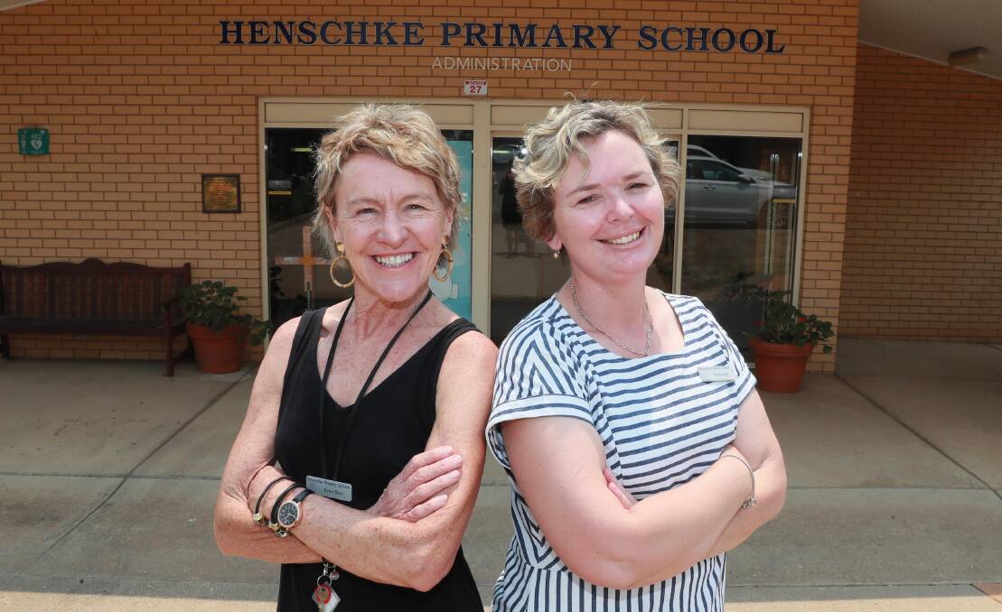 SCHOOL'S OUT: Henschke chaplain Karyn Ross with assistant principal Maria Emery, on the last day of school. Picture: Les Smith