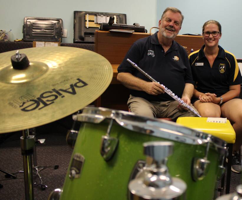 MAINLY MUSIC: Rural Aid general manager Wayne Thomson and Lake Albert Primary band coordinator Jessica Chapman. Picture: Emma Horn