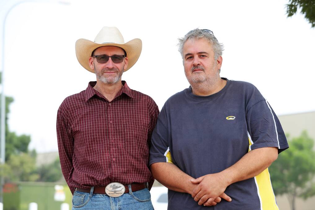 'THE LUCKY FEW': Glenn Lavis and John Arronis from Tumbarumba, are counting their blessings after a harrowing week witnessing horrific scenes. Picture: Emma Hillier