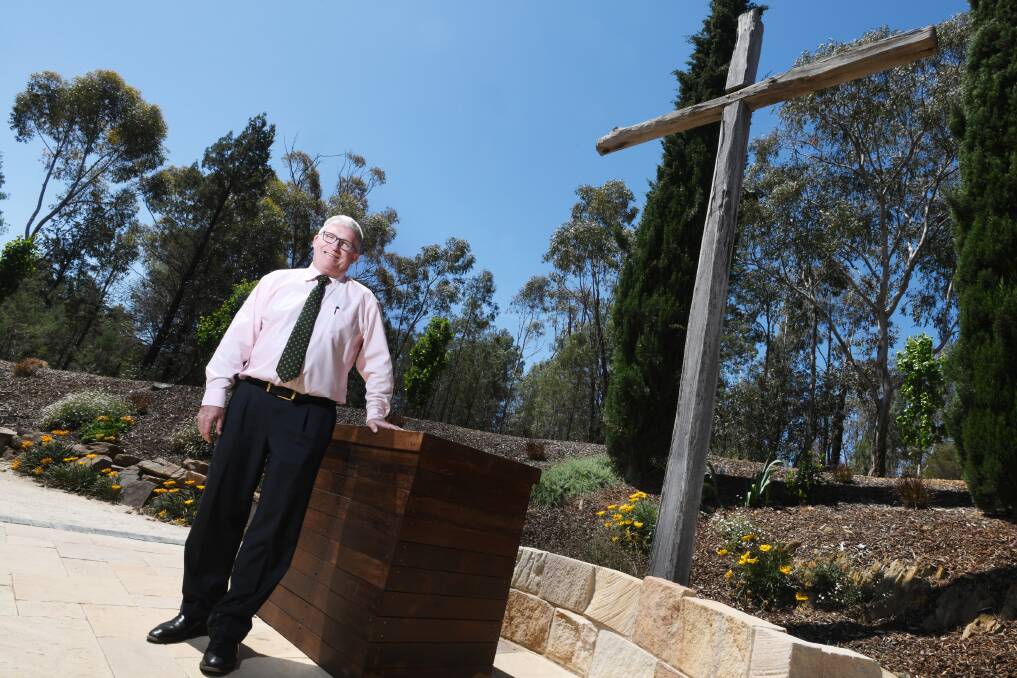 DECADES OF SERVICE: Father Paddy Sykes celebrated his silver jubilee with an open-air mass at the tree chapel in the Botanic Gardens.