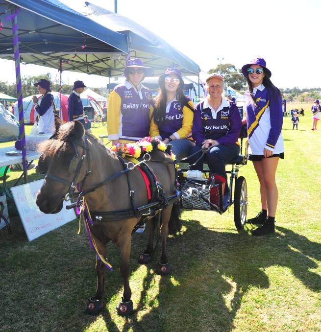 A HORSE OF COURSE: Rachael and Indiya Fikkers, Mel Smith and Steff Dickie with Santos the miniature horse. Picture: Chelsea Sutton.