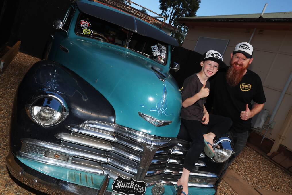 READY TO ROLL: Howard Brown with son Spencer 7, and 'Delilah', the family's 1948 Chevrolet Fleetmaster. Picture: Emma Hillier