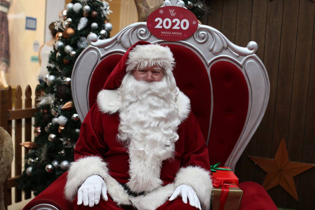 ARRIVED: Santa takes his seat in Wagga's Marketplace after arriving early on Saturday morning. Picture: Emma Horn