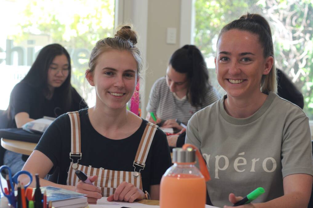 STUDY SEASON: Paige Burkinshaw from Wagga Christian College and Brianna Hatty from Kildare Catholic College at Achieve Tutoring's English paper two study session on Tuesday. Picture: Emma Horn