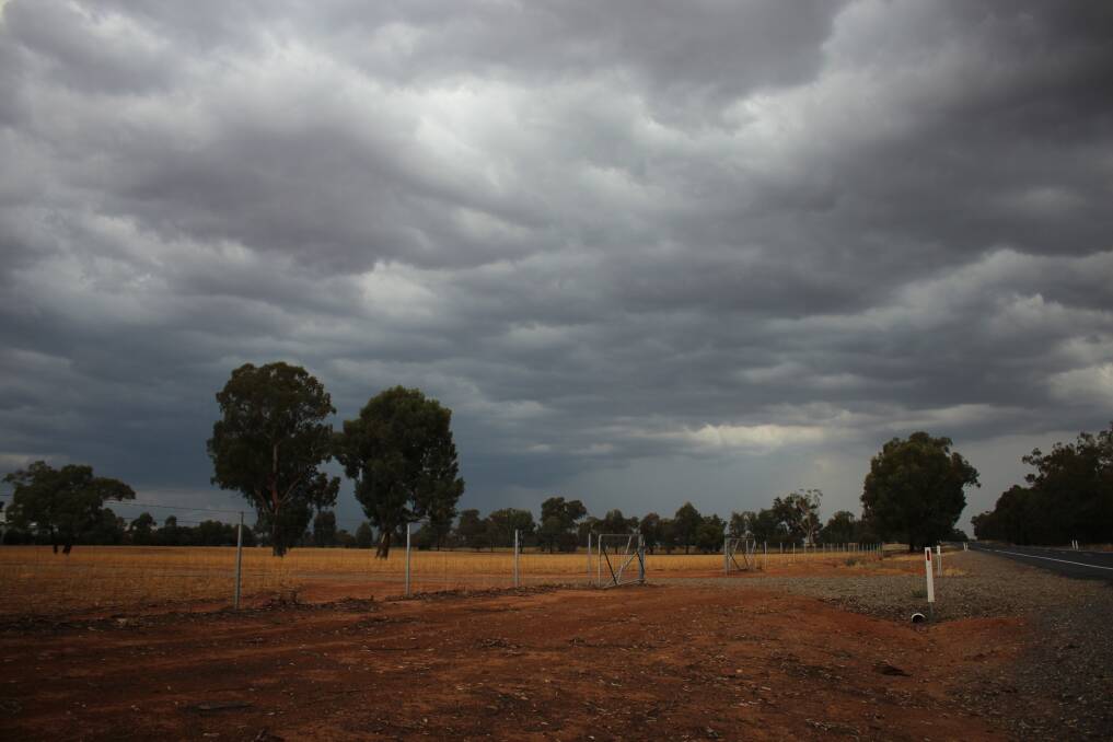 Storm clouds roll over the region, as seen from the Olympic Highway between Junee and Wagga on Tuesday. Picture: Emma Horn