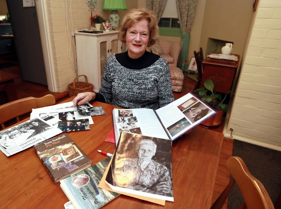 MEMORIES: Helen O'Connell at her home in Wagga, wades through records from her uncle Dudley Marrow's life during the Second World War. Picture: Les Smith