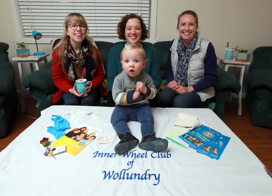 Wollundry Inner Wheel members Marie-Claire Grosfeld, Eleanore Thompson with her 11-month-old son Andrew, and Elise Bowen. Picture: Emma Hillier