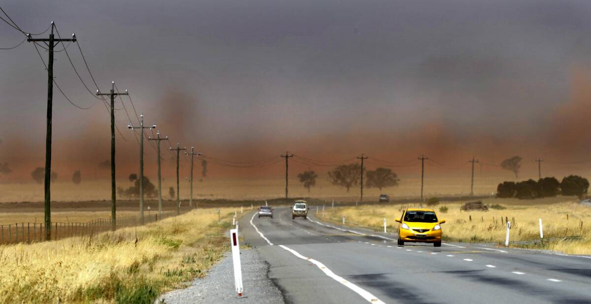 STORM ON THE WAY: Dust rolls across the Newell Highway near Grong Grong.
