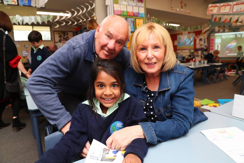 GRAND DAY: Five-year-old Quinnzaarra Sankar with her grandparents Ray and Anne Pankhurst at the Lutheran School grandparents' day. Picture: Emma Hillier